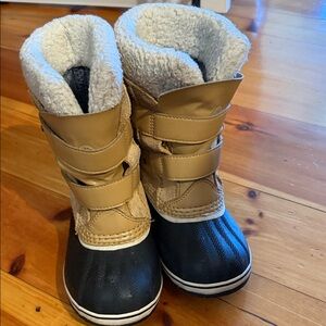 Sorel Tan and Black Winter Boots